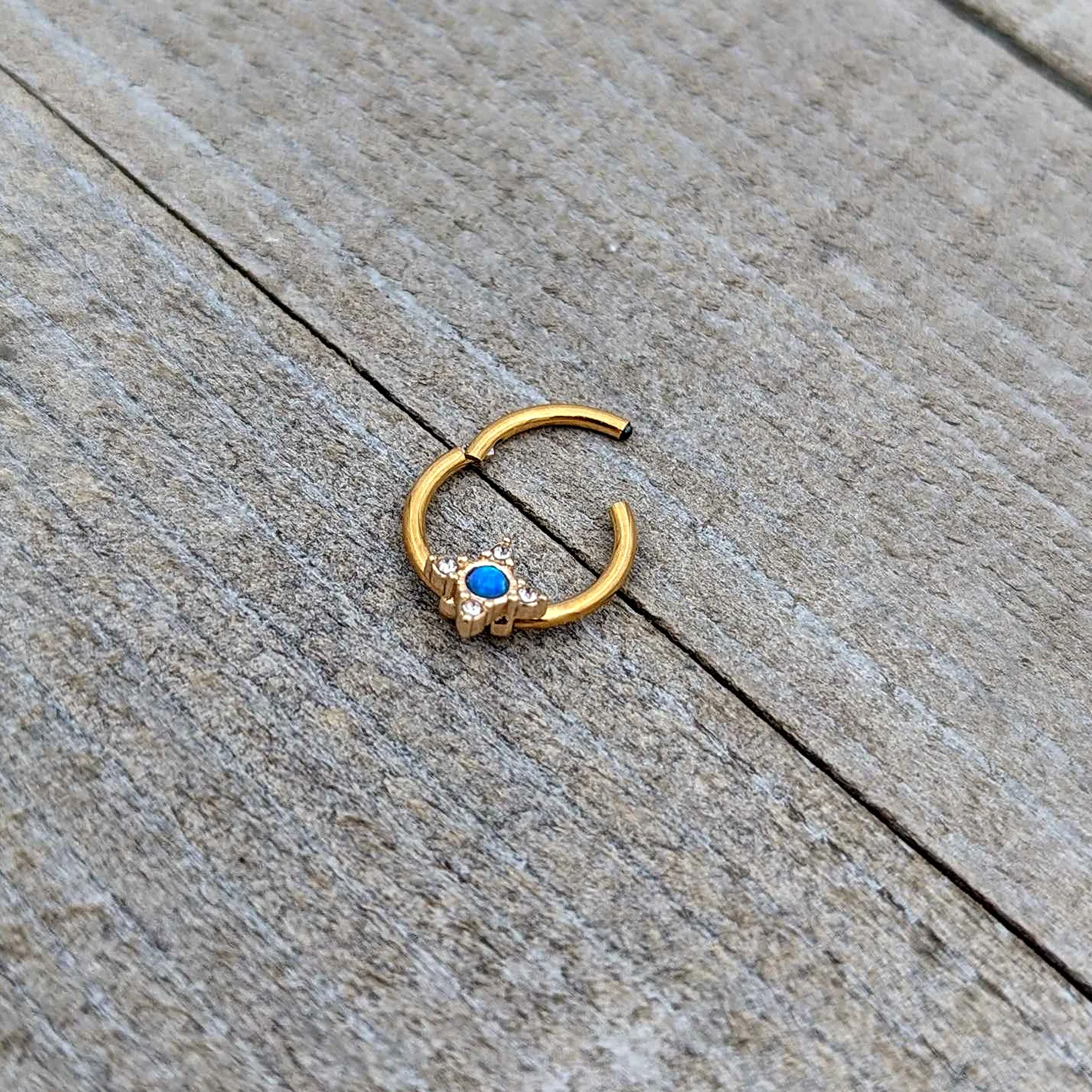 16 Gauge 3/8 Blue Synthetic Opal Gold Hue Rhombus Hinged Segment Ring