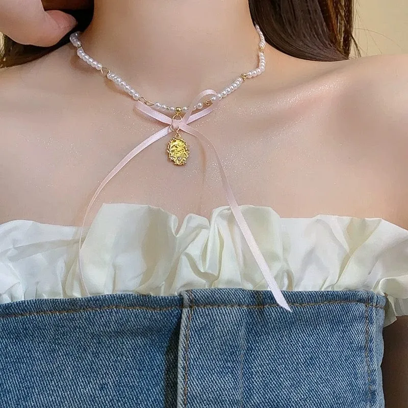 Baroque Pink Ribbon Bowknot Relief Pendant Pearl Necklace