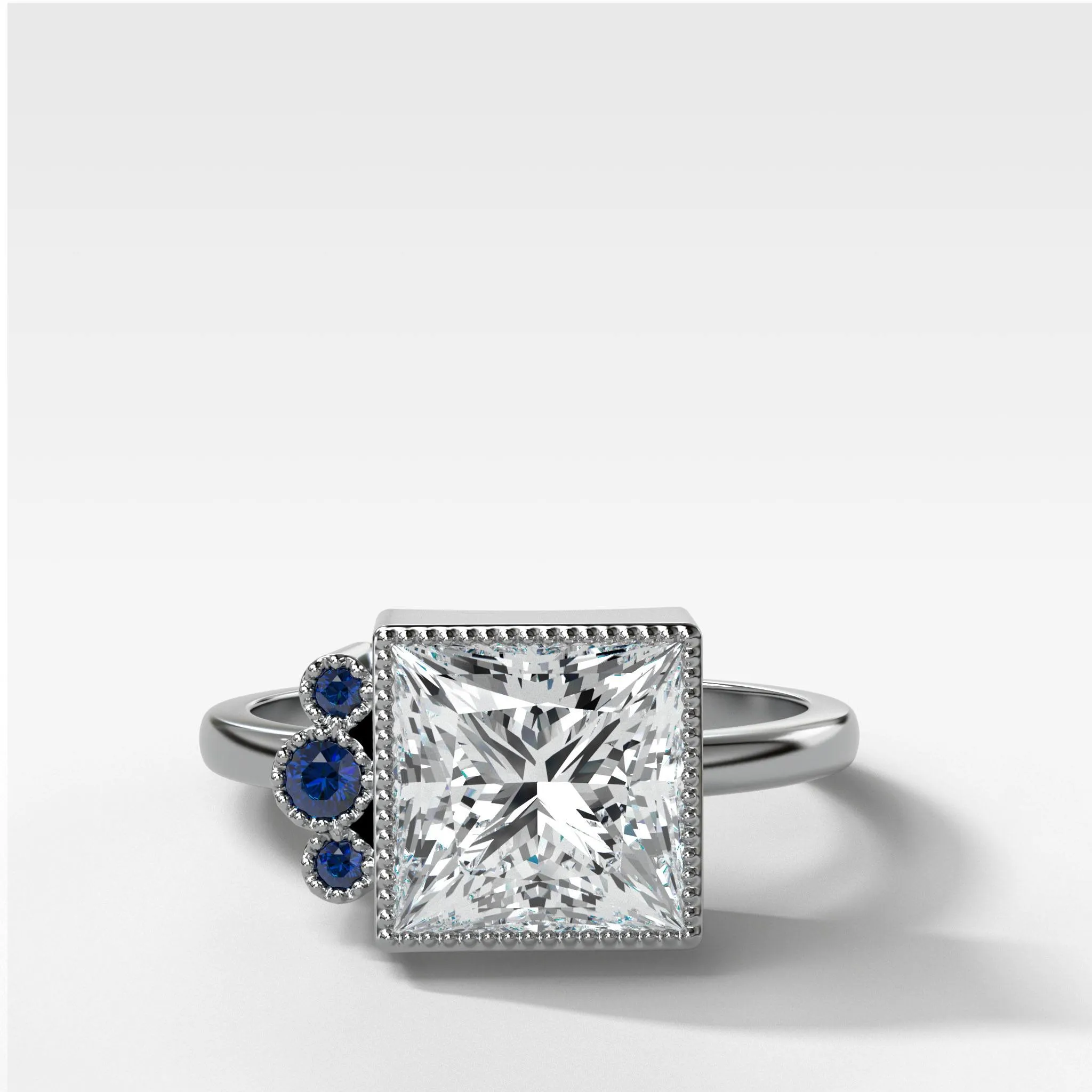 Blue Sapphire Cluster Engagement Ring With Princess Cut