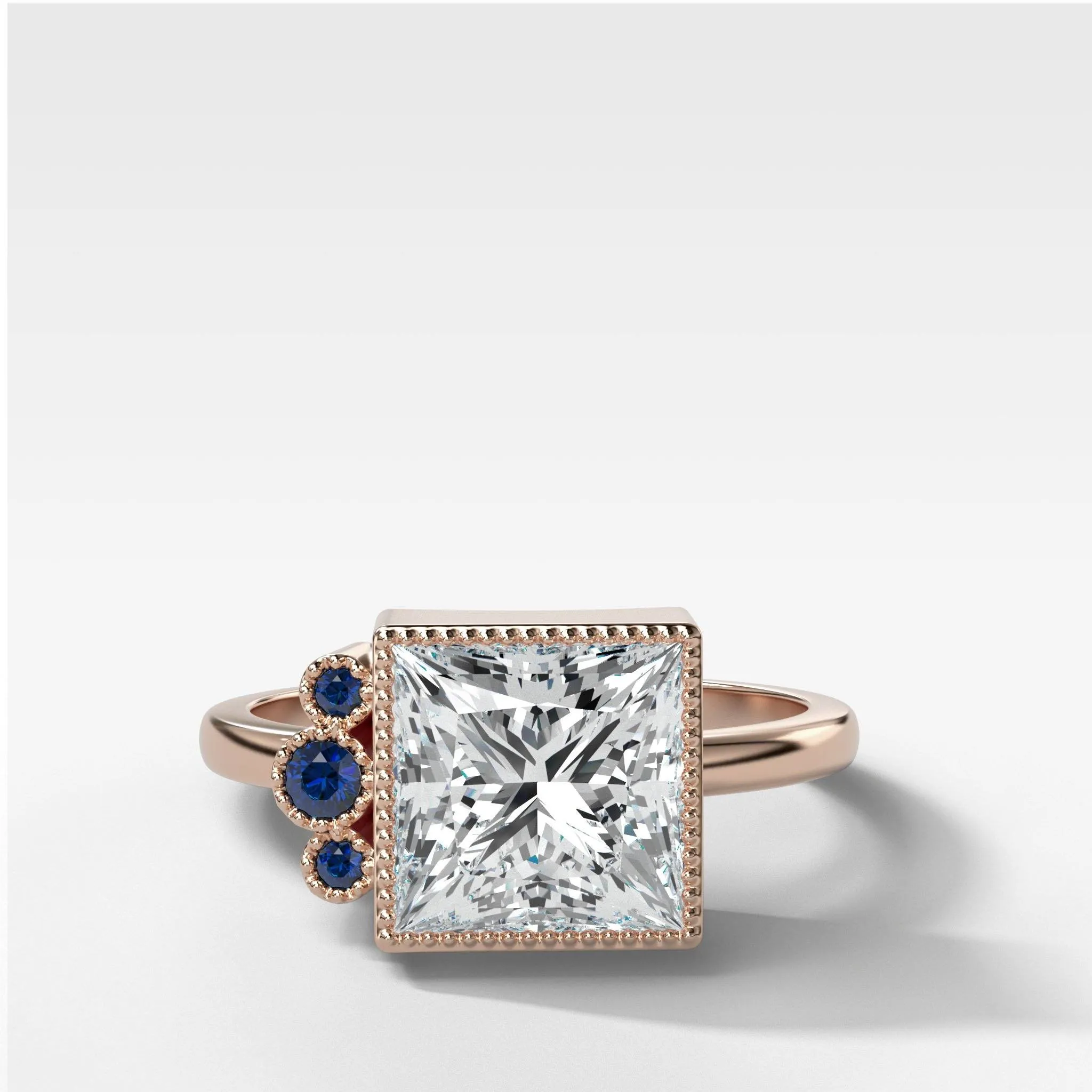 Blue Sapphire Cluster Engagement Ring With Princess Cut