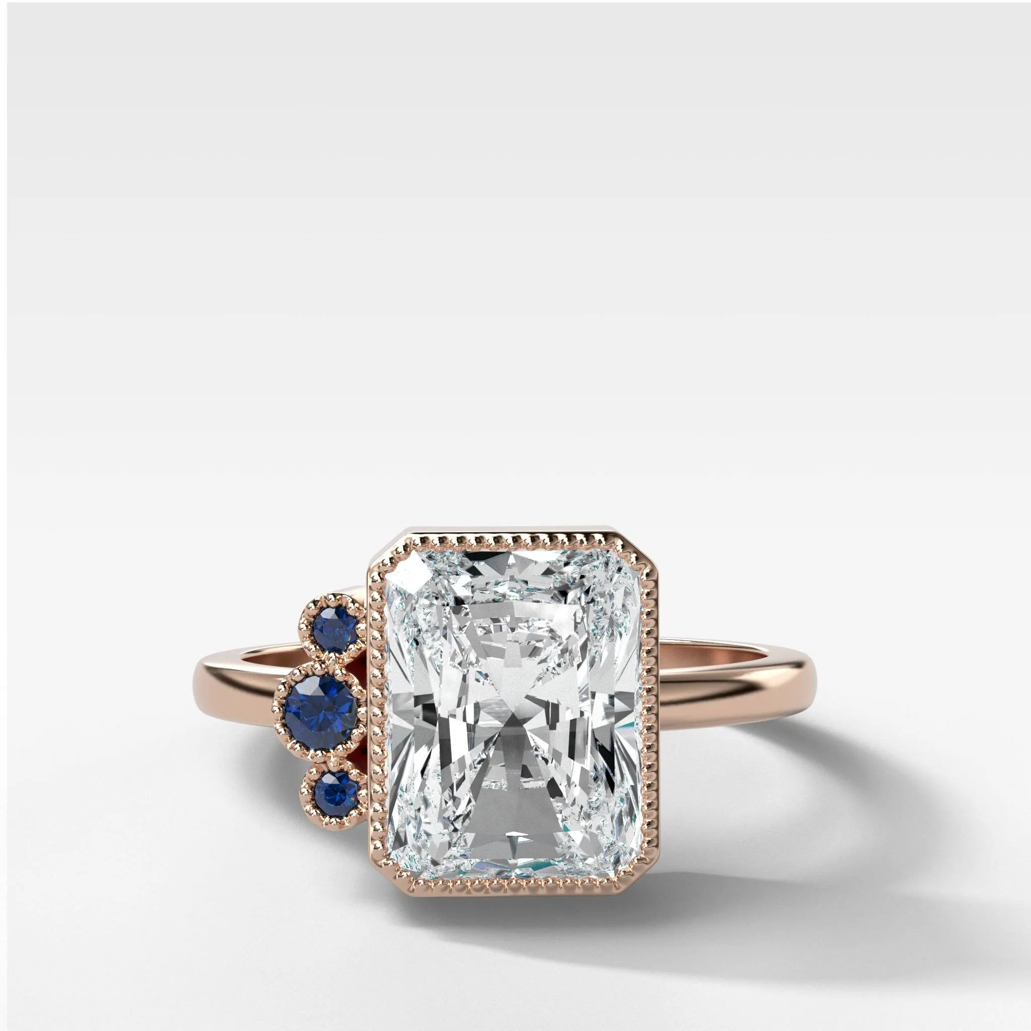 Blue Sapphire Cluster Engagement Ring With Radiant Cut