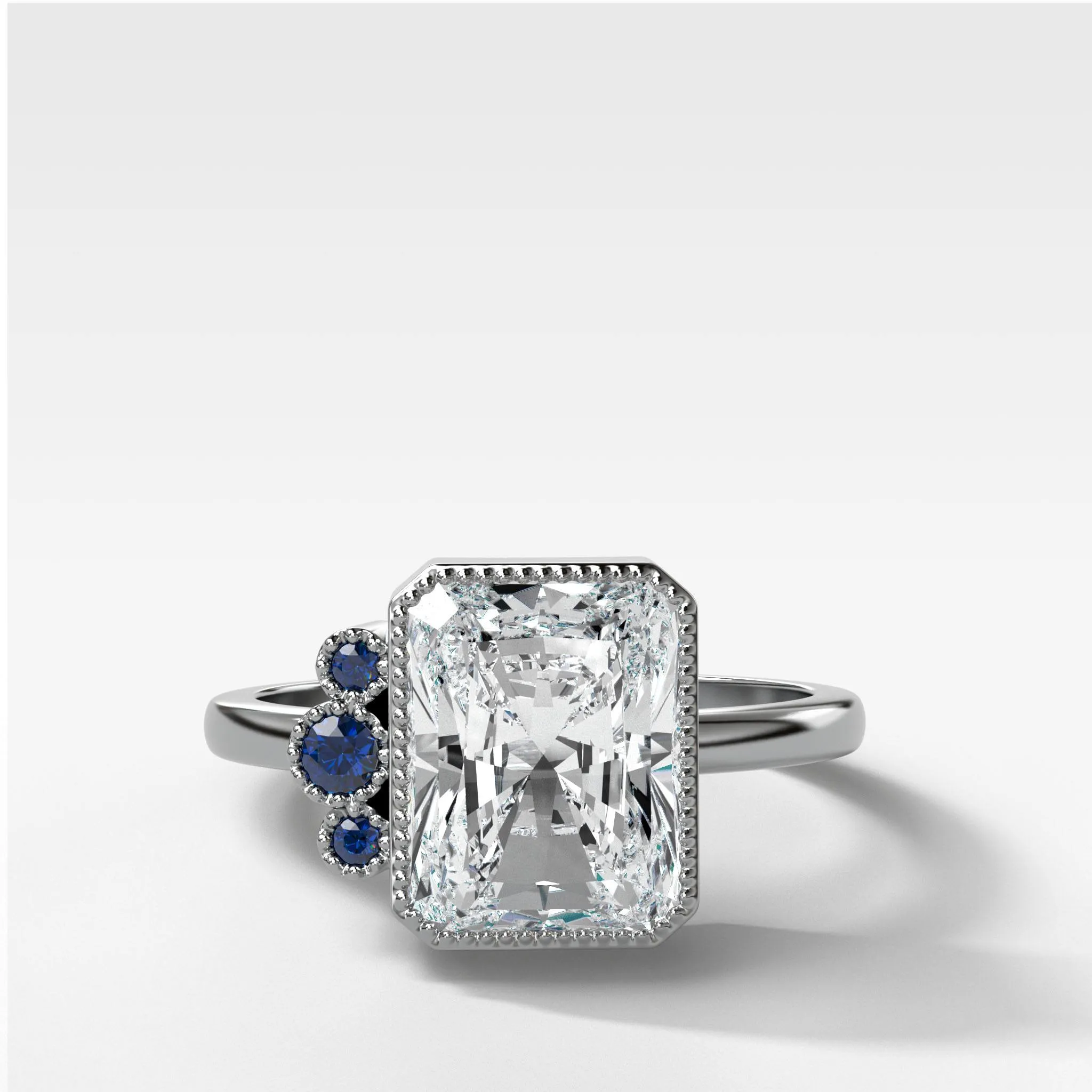 Blue Sapphire Cluster Engagement Ring With Radiant Cut