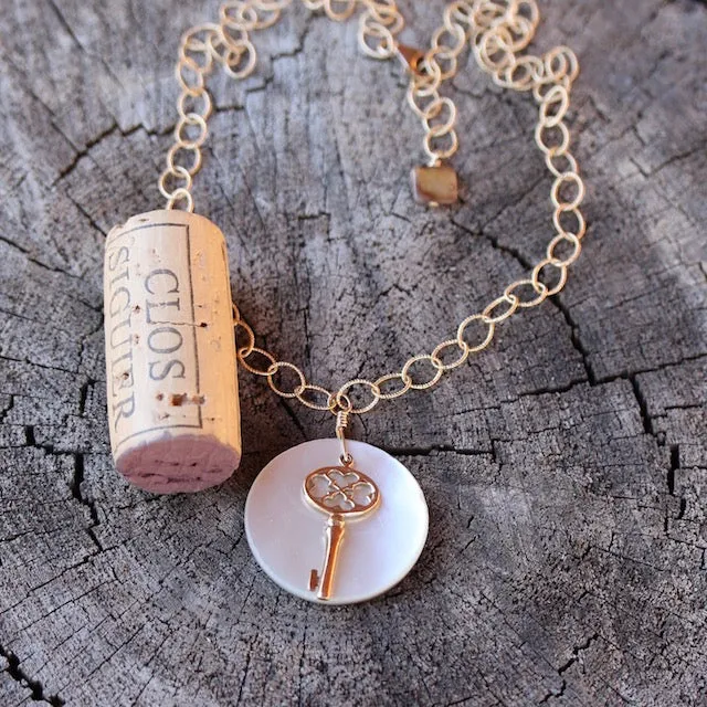 Bronze key with pearly shell pendant necklace on 14k gold filled chain