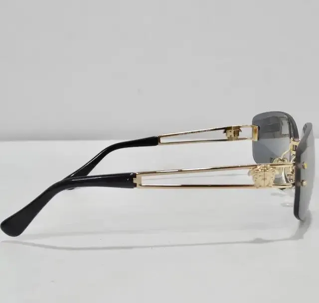 Versace 1990s Blue and Gold Sunglasses