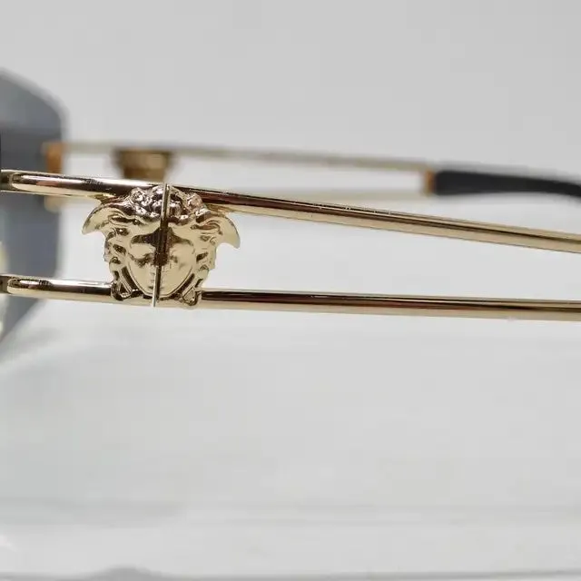 Versace 1990s Blue and Gold Sunglasses